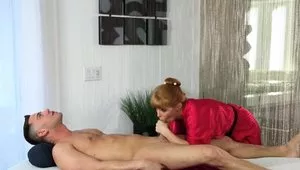 Redhead Masseuse In Red Robe Fetish Handjob